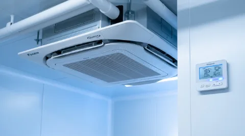 Climate-controlled storage facility with precision temperature and humidity regulation